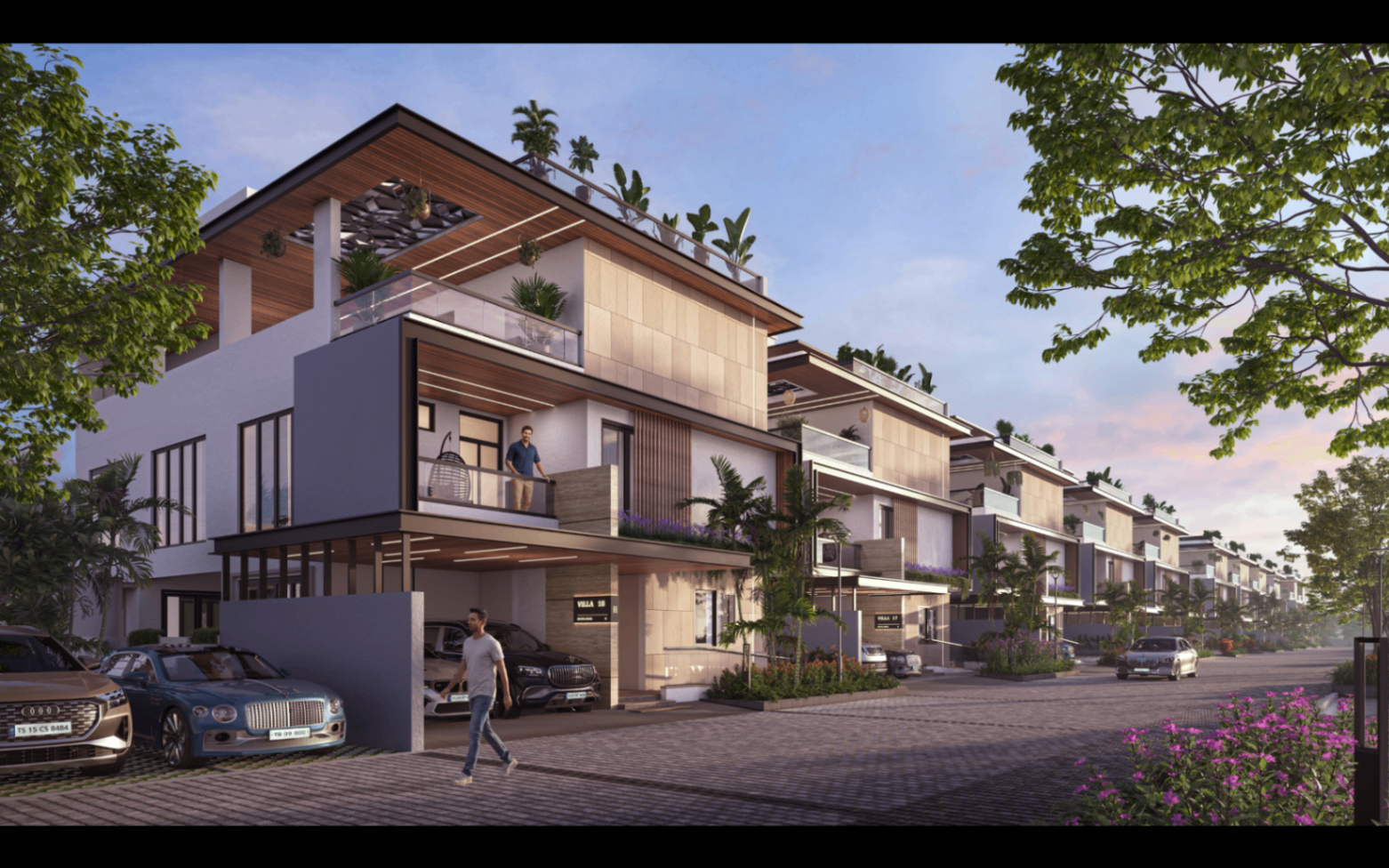 Satva Amora luxury triplex villas along a landscaped internal street